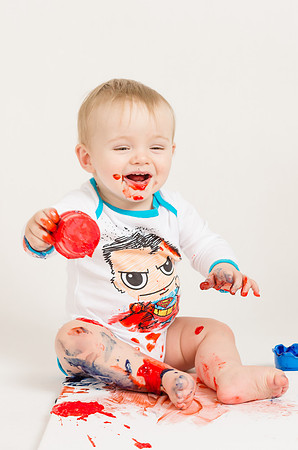 Baby-get-fun-when-he-played-with-the-paint