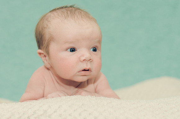 cute-baby-with-green-background