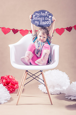 chair-child-decoration-heart-shape-holding-sign