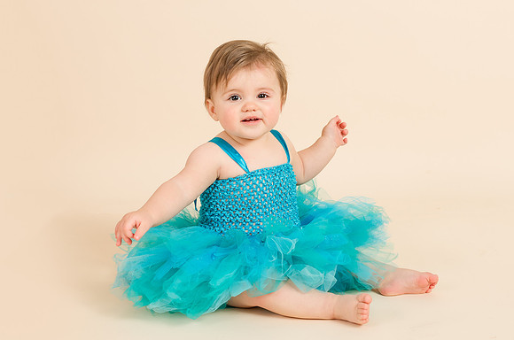 happy-baby-with-blue-dress