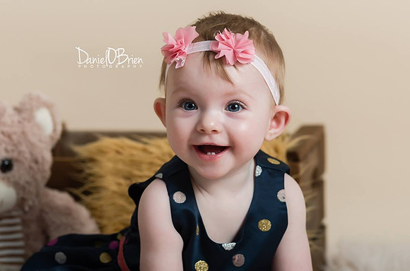 cute-baby-with-headband-flower