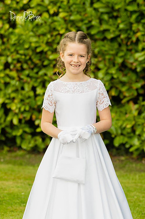 Girl-with-White-Dress-Smiling-Garden