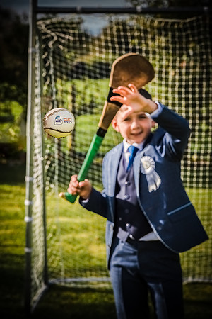 Boy-playing-hurling-in-the-pitch