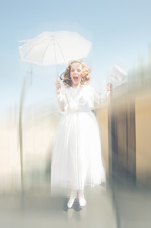 communion-girl-jumping-on-the-trampoline
