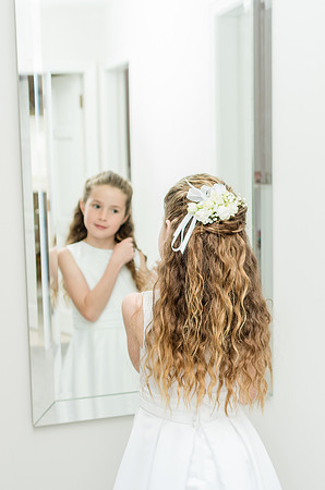 communion-girl-looking-in-the-mirror