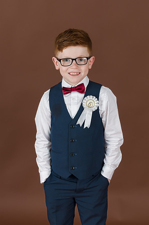 communion-boy-with-his-hands-in-his-pockets