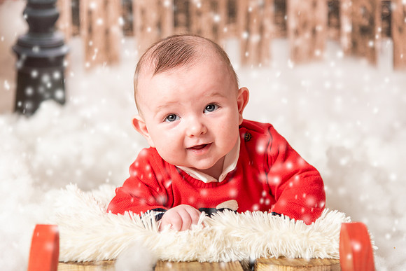 Happy-Baby-on-a-sleigh