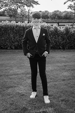 Confirmation boy with his hands in the pockets
